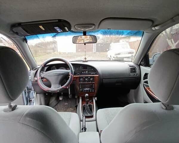 Сірий Деу Нубіра, об'ємом двигуна 2.02 л та пробігом 300 тис. км за 2500 $, фото 8 на Automoto.ua