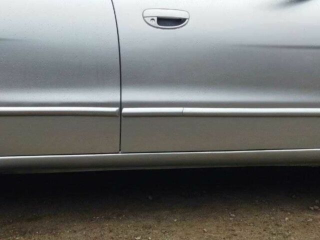 Серый Дэу Нубира, объемом двигателя 2 л и пробегом 300 тыс. км за 3000 $, фото 4 на Automoto.ua