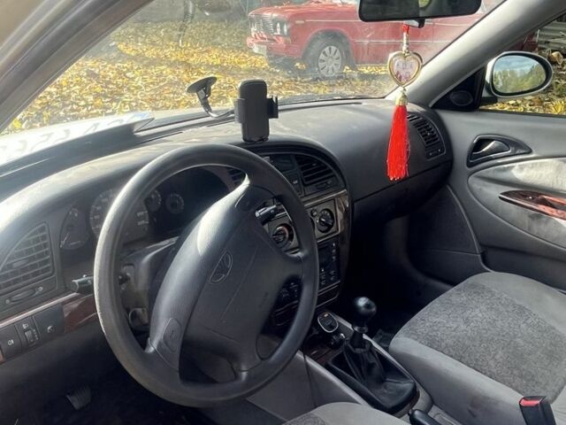 Сірий Деу Нубіра, об'ємом двигуна 2 л та пробігом 240 тис. км за 1200 $, фото 2 на Automoto.ua