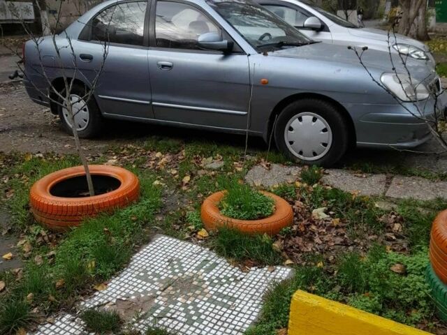 Сірий Деу Нубіра, об'ємом двигуна 1.6 л та пробігом 198 тис. км за 2000 $, фото 9 на Automoto.ua