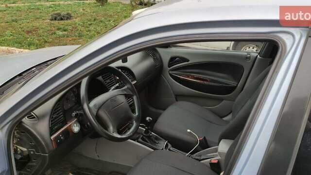 Сірий Деу Нубіра, об'ємом двигуна 2 л та пробігом 153 тис. км за 3300 $, фото 6 на Automoto.ua