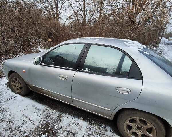 Серый Дэу Нубира, объемом двигателя 2 л и пробегом 260 тыс. км за 2000 $, фото 2 на Automoto.ua