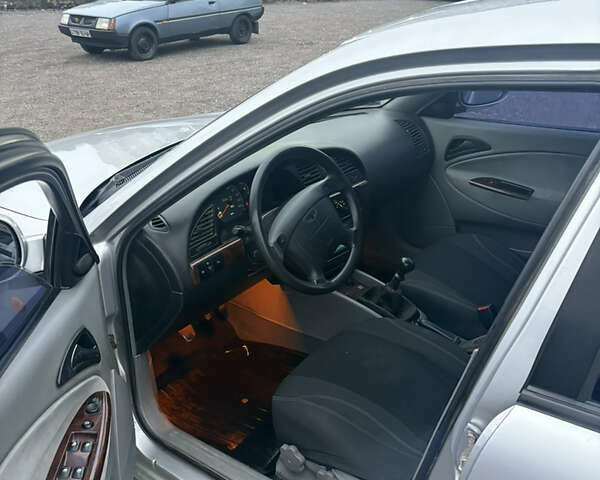 Серый Дэу Нубира, объемом двигателя 2 л и пробегом 230 тыс. км за 2500 $, фото 6 на Automoto.ua