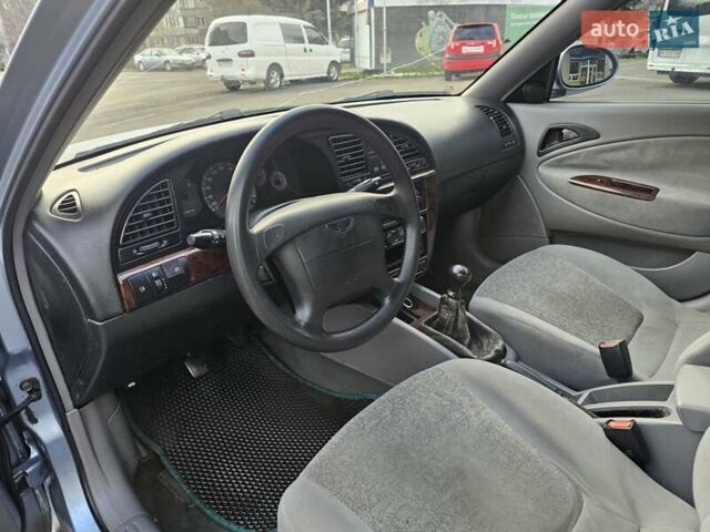 Серый Дэу Нубира, объемом двигателя 2 л и пробегом 247 тыс. км за 1700 $, фото 8 на Automoto.ua