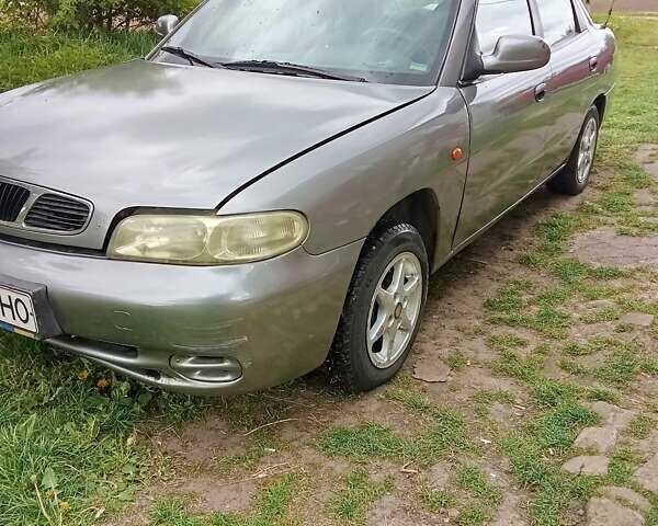 Сірий Деу Нубіра, об'ємом двигуна 1.6 л та пробігом 300 тис. км за 1350 $, фото 1 на Automoto.ua