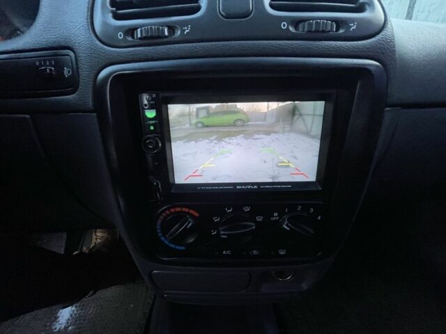 Серый Дэу Нубира, объемом двигателя 2 л и пробегом 312 тыс. км за 2200 $, фото 4 на Automoto.ua