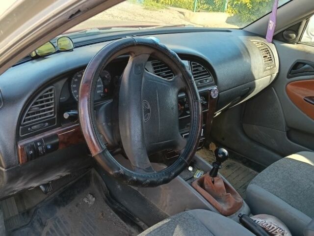 Серый Дэу Нубира, объемом двигателя 2 л и пробегом 178 тыс. км за 1500 $, фото 7 на Automoto.ua