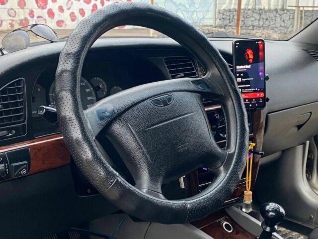 Серый Дэу Нубира, объемом двигателя 2 л и пробегом 3 тыс. км за 2600 $, фото 4 на Automoto.ua