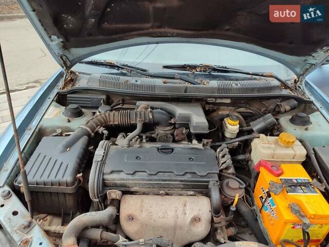 Серый Дэу Нубира, объемом двигателя 2 л и пробегом 200 тыс. км за 2300 $, фото 5 на Automoto.ua