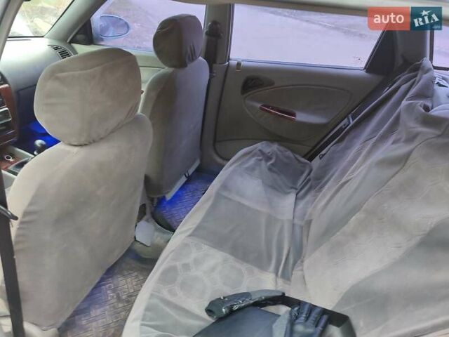 Серый Дэу Нубира, объемом двигателя 2 л и пробегом 200 тыс. км за 2300 $, фото 2 на Automoto.ua