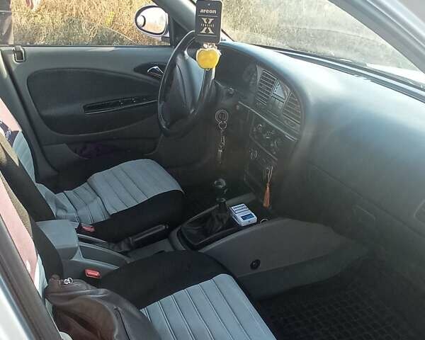 Серый Дэу Нубира, объемом двигателя 1.6 л и пробегом 160 тыс. км за 2600 $, фото 8 на Automoto.ua