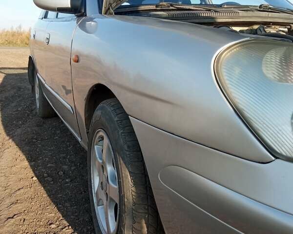 Серый Дэу Нубира, объемом двигателя 1.6 л и пробегом 160 тыс. км за 2600 $, фото 2 на Automoto.ua