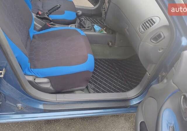 Синій Деу Нубіра, об'ємом двигуна 2 л та пробігом 180 тис. км за 2999 $, фото 21 на Automoto.ua