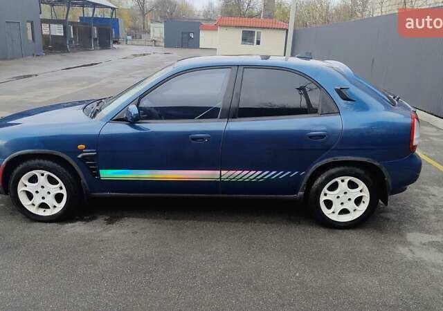 Синій Деу Нубіра, об'ємом двигуна 2 л та пробігом 180 тис. км за 2999 $, фото 8 на Automoto.ua