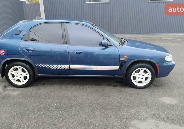 Синій Деу Нубіра, об'ємом двигуна 2 л та пробігом 180 тис. км за 2999 $, фото 4 на Automoto.ua