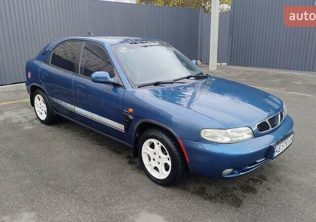 Синій Деу Нубіра, об'ємом двигуна 2 л та пробігом 180 тис. км за 2999 $, фото 3 на Automoto.ua