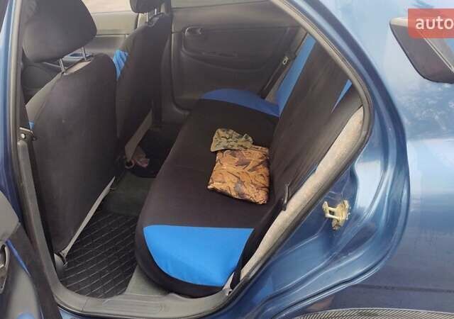 Синій Деу Нубіра, об'ємом двигуна 2 л та пробігом 180 тис. км за 2999 $, фото 26 на Automoto.ua