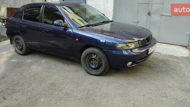 Синій Деу Нубіра, об'ємом двигуна 1.6 л та пробігом 260 тис. км за 2700 $, фото 6 на Automoto.ua