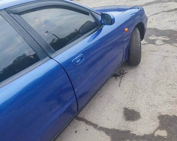 Синій Деу Нубіра, об'ємом двигуна 2 л та пробігом 250 тис. км за 1099 $, фото 2 на Automoto.ua