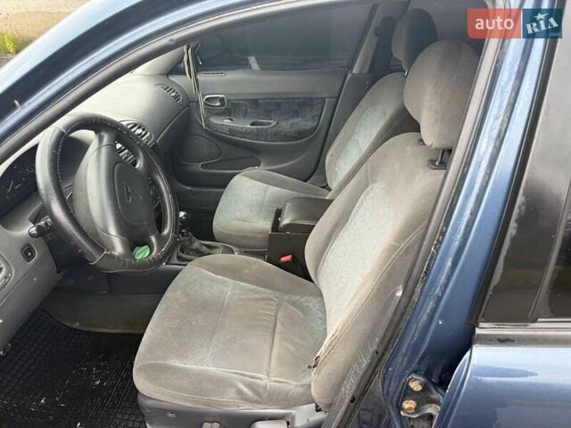Синий Дэу Нубира, объемом двигателя 1.6 л и пробегом 300 тыс. км за 1294 $, фото 7 на Automoto.ua