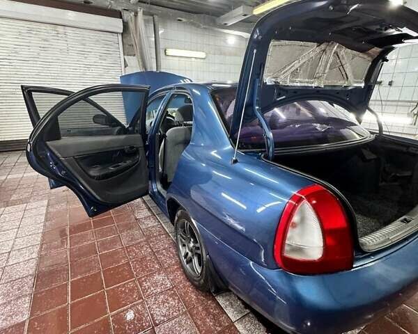 Синий Дэу Нубира, объемом двигателя 1.6 л и пробегом 268 тыс. км за 2400 $, фото 10 на Automoto.ua