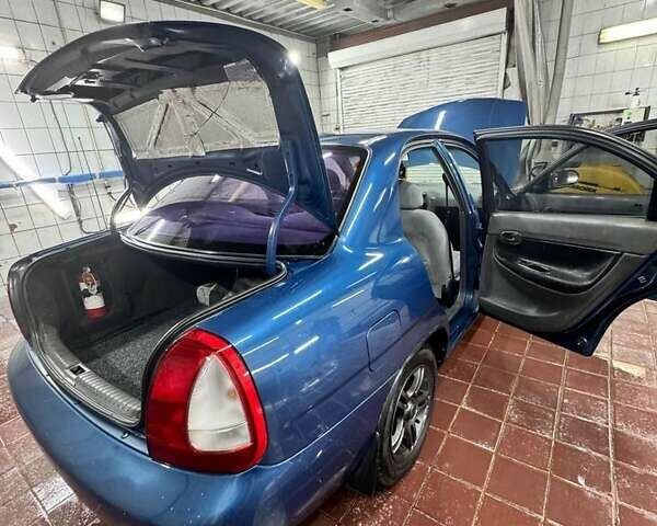 Синий Дэу Нубира, объемом двигателя 1.6 л и пробегом 268 тыс. км за 2400 $, фото 6 на Automoto.ua