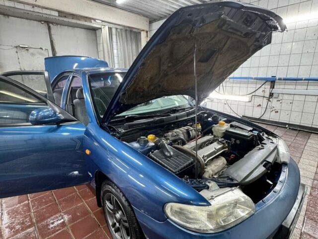 Синій Деу Нубіра, об'ємом двигуна 1.6 л та пробігом 268 тис. км за 2400 $, фото 14 на Automoto.ua