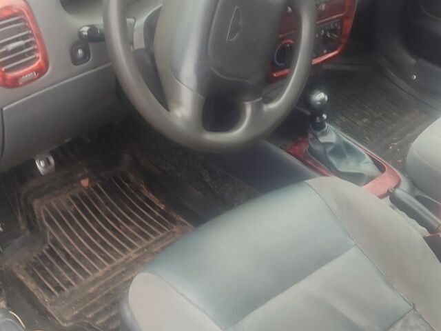 Синій Деу Нубіра, об'ємом двигуна 1.6 л та пробігом 203 тис. км за 950 $, фото 2 на Automoto.ua