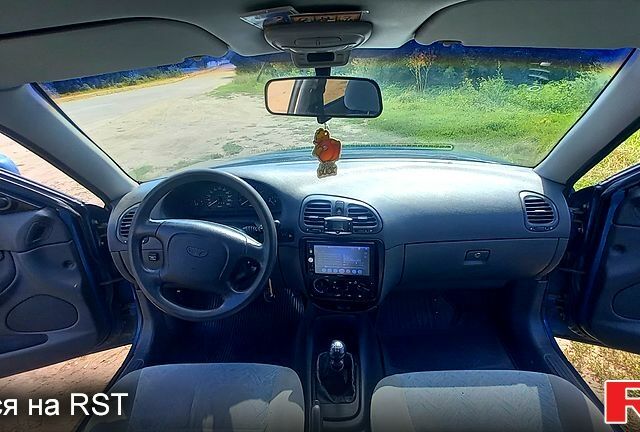 Синий Дэу Нубира, объемом двигателя 1.6 л и пробегом 224 тыс. км за 2600 $, фото 4 на Automoto.ua