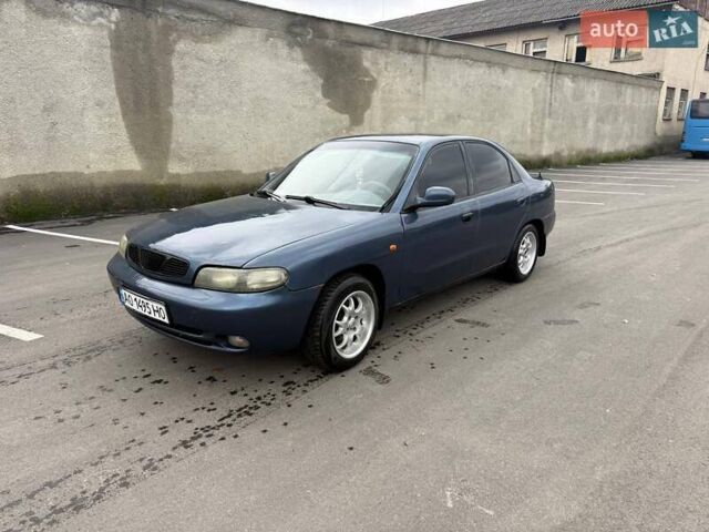Синий Дэу Нубира, объемом двигателя 1.6 л и пробегом 300 тыс. км за 1294 $, фото 4 на Automoto.ua
