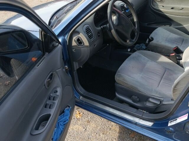 Синій Деу Нубіра, об'ємом двигуна 1 л та пробігом 320 тис. км за 1600 $, фото 2 на Automoto.ua