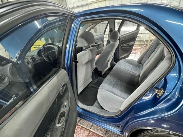 Синій Деу Нубіра, об'ємом двигуна 1.6 л та пробігом 268 тис. км за 2400 $, фото 4 на Automoto.ua