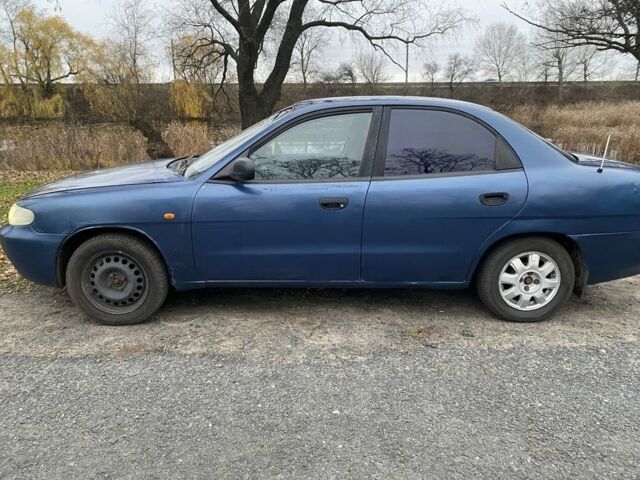 Синій Деу Нубіра, об'ємом двигуна 1.6 л та пробігом 370 тис. км за 1000 $, фото 8 на Automoto.ua