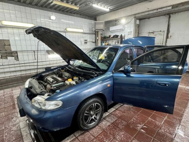 Синій Деу Нубіра, об'ємом двигуна 1.6 л та пробігом 268 тис. км за 2400 $, фото 1 на Automoto.ua