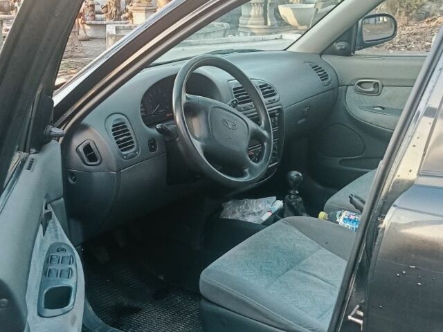 Синій Деу Нубіра, об'ємом двигуна 1.6 л та пробігом 137 тис. км за 1700 $, фото 6 на Automoto.ua