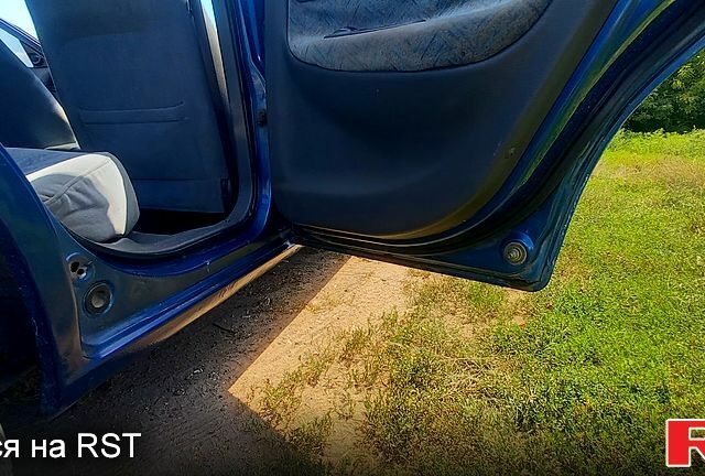 Синий Дэу Нубира, объемом двигателя 1.6 л и пробегом 224 тыс. км за 2600 $, фото 2 на Automoto.ua