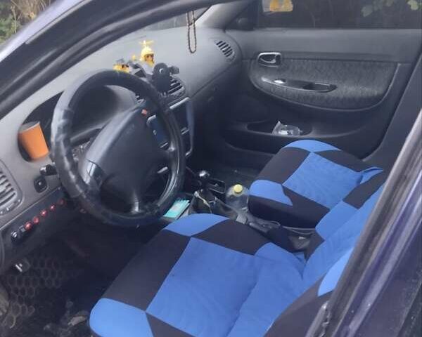 Синій Деу Нубіра, об'ємом двигуна 1.6 л та пробігом 330 тис. км за 1500 $, фото 4 на Automoto.ua