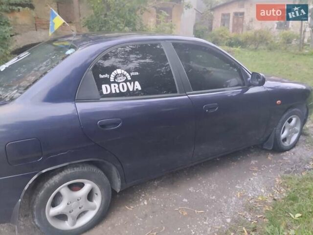 Синій Деу Нубіра, об'ємом двигуна 1.6 л та пробігом 330 тис. км за 1500 $, фото 2 на Automoto.ua