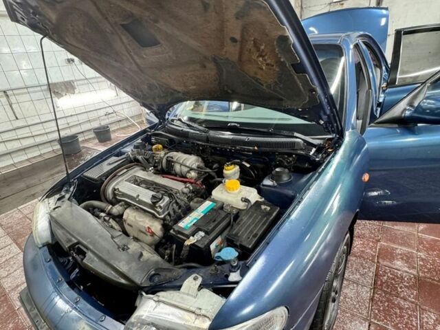 Синій Деу Нубіра, об'ємом двигуна 1.6 л та пробігом 268 тис. км за 2400 $, фото 6 на Automoto.ua