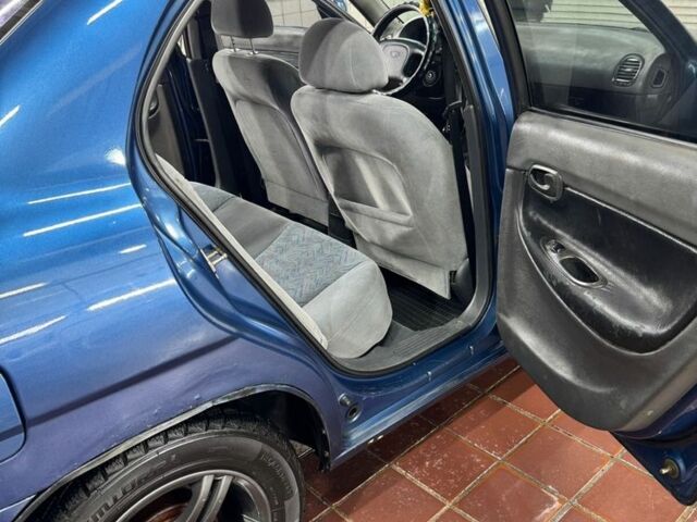 Синій Деу Нубіра, об'ємом двигуна 1.6 л та пробігом 268 тис. км за 2400 $, фото 8 на Automoto.ua