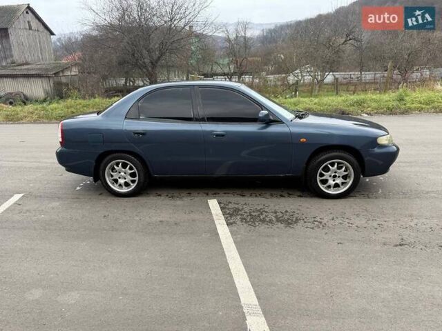 Синий Дэу Нубира, объемом двигателя 1.6 л и пробегом 300 тыс. км за 1294 $, фото 1 на Automoto.ua