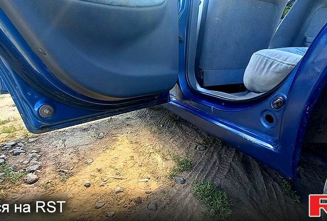 Синий Дэу Нубира, объемом двигателя 1.6 л и пробегом 224 тыс. км за 2600 $, фото 6 на Automoto.ua