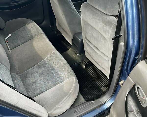 Синій Деу Нубіра, об'ємом двигуна 1.6 л та пробігом 217 тис. км за 2100 $, фото 9 на Automoto.ua