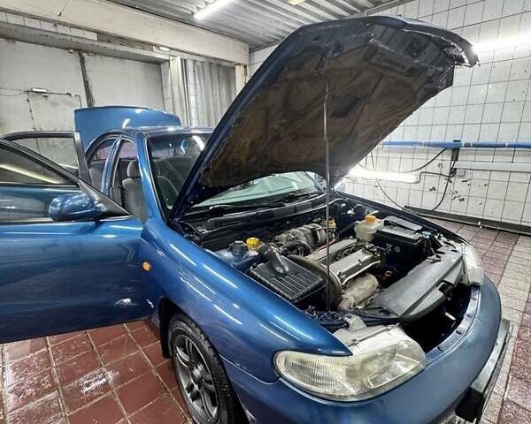 Синий Дэу Нубира, объемом двигателя 1.6 л и пробегом 268 тыс. км за 2400 $, фото 13 на Automoto.ua