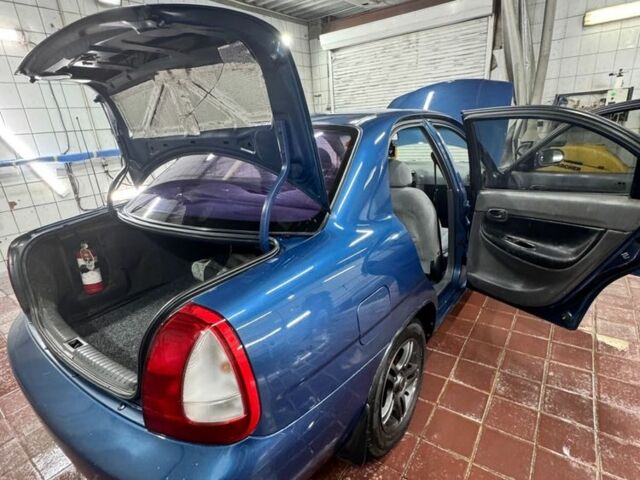 Синій Деу Нубіра, об'ємом двигуна 1.6 л та пробігом 268 тис. км за 2400 $, фото 7 на Automoto.ua