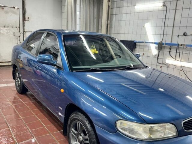 Синій Деу Нубіра, об'ємом двигуна 1.6 л та пробігом 268 тис. км за 2400 $, фото 16 на Automoto.ua