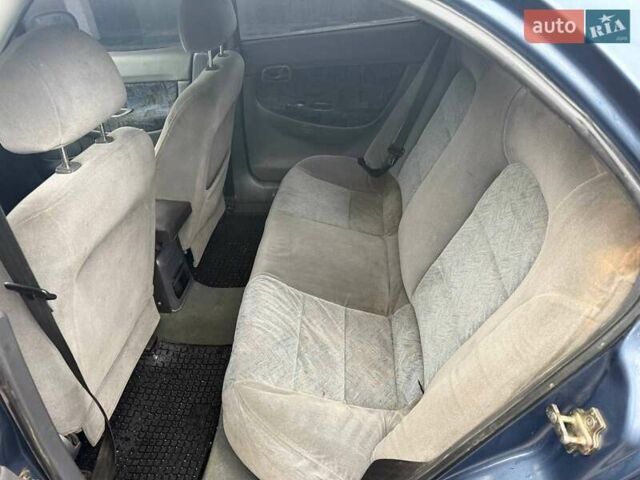 Синий Дэу Нубира, объемом двигателя 1.6 л и пробегом 300 тыс. км за 1294 $, фото 8 на Automoto.ua