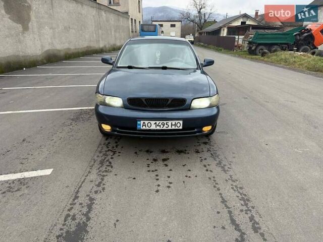 Синий Дэу Нубира, объемом двигателя 1.6 л и пробегом 300 тыс. км за 1294 $, фото 6 на Automoto.ua