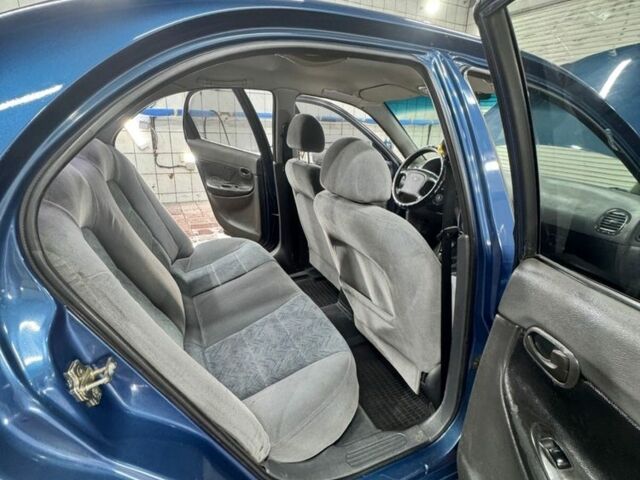 Синій Деу Нубіра, об'ємом двигуна 1.6 л та пробігом 268 тис. км за 2400 $, фото 9 на Automoto.ua