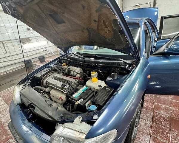 Синий Дэу Нубира, объемом двигателя 1.6 л и пробегом 268 тыс. км за 2400 $, фото 5 на Automoto.ua